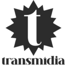 Logotipo da Transmídia composto por um símbolo escuro em formato estrelado com a letra “t” estilizada no centro, acompanhado do nome “transmídia” abaixo, em tipografia serifada.