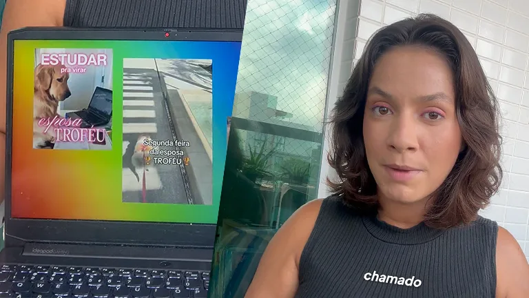 A imagem está dividida em duas partes. À esquerda, aparece a tela de um notebook aberta, exibindo conteúdos semelhantes a posts ou vídeos de redes sociais. Um deles mostra um cachorro ao lado do texto “ESTUDAR pra virar esposa TROFÉU”. Ao lado, há outro conteúdo com a imagem de uma pessoa caminhando em uma faixa de pedestres, acompanhado da frase “Segunda-feira da esposa TROFÉU ✨”. O fundo da tela tem um degradê colorido, com tons de verde, azul e amarelo. À direita, aparece uma mulher jovem adulta, de pele clara, com cabelos castanhos curtos e ondulados, na altura do queixo. Ela usa uma blusa preta sem mangas e maquiagem em tons rosados nos olhos. Seu olhar está direcionado para a câmera, com expressão séria e atenta, como se estivesse explicando algo. Ao fundo, há uma varanda com grade de proteção e vista para prédios e céu parcialmente nublado. A iluminação é natural, vinda do lado direito da imagem.
